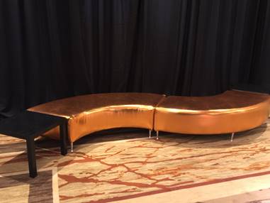 Gold serpentine sofa.jpg